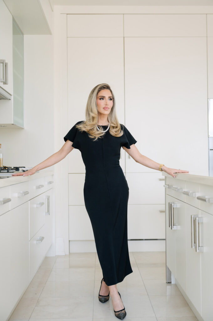 woman posing in a kitchen